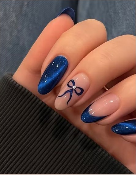 Midnight blue bow accent nails